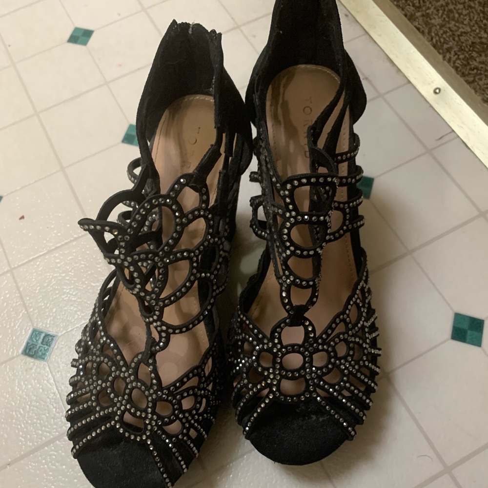 Size 11W. Worn once. 4” wedge heel
